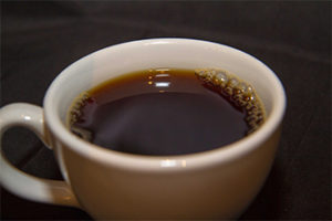 Black coffee in a brown mug